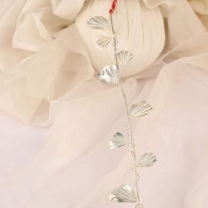 Silver plated metal toran embellished with entwined wire petals detailing