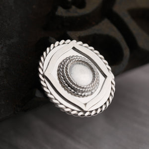 92.5 Sterling Silver Coin with entwined border and bold circular emblem detailing