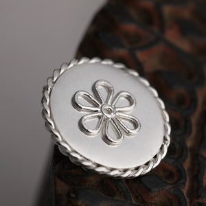 92.5 Sterling Silver Coin with entwined border and delicate flower outline detailing