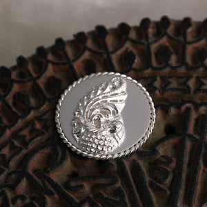 92.5 Sterling Silver Coin with entwined border and decorative peacock detailing