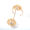 Gold toned serrate and crystal haathphool