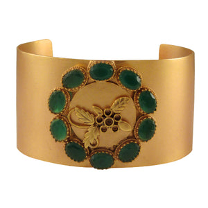 gold-cuff-with-green-crystals