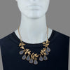 GOLD PLATED 9 ACRYLIC DROPS AND SERRATE LEAVES NECKPIECE