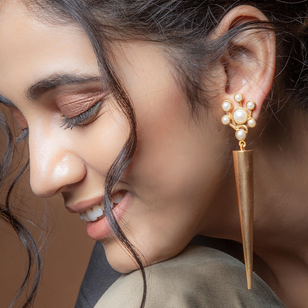 Gold plated cluster pearls and cone earring wore by Pragya jaiswal