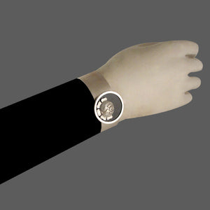 SILVER PLATED THIN CUFF WITH BLACK AC AND ROSE COIN ON CENTER