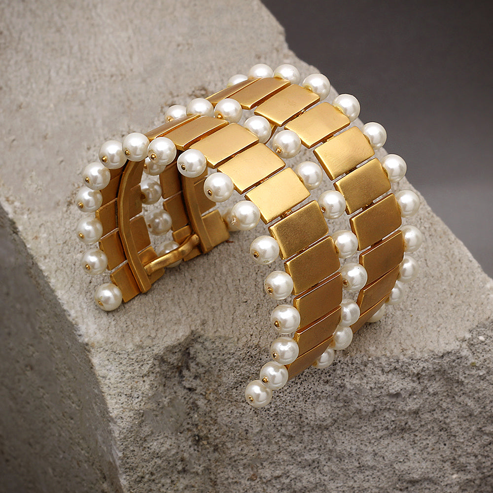 Gold toned brick and pearl cuff