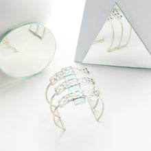 Load image into Gallery viewer, SILVER TONED TRIPLE LINED DOTTED CUFF OVERLAID ON CYAN ACRYLIC BLOCK
