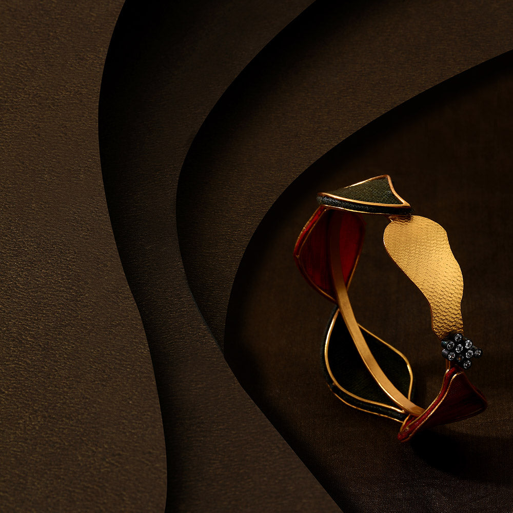 Buy Fashionable Gold Plated Terra Tangle Bangle Online | Suhani Pittie