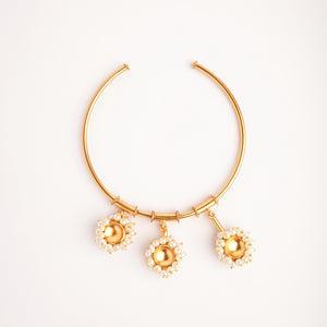 Pearl bunch gold arm band