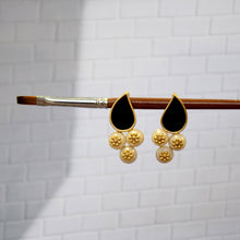 Load image into Gallery viewer, GOLD TONED AND BLACK PETAL STUD EARRINGS WITH PEARL DROPS
