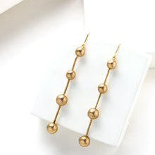 Load image into Gallery viewer, Gold Toned &#39;String of Beads&#39; Drop Earrings
