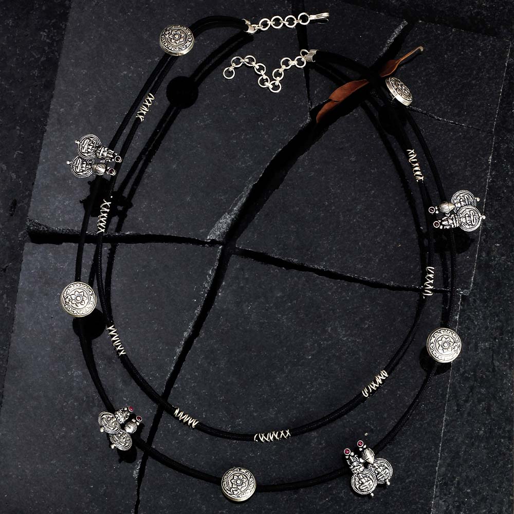 92.5 SILVER 2 LINE BLACK CORD & TWISTED WIRE NECKPIECE WITH ROUND STAMPS AND KASULAPERU COINS ON IT