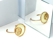 Load image into Gallery viewer, GOLD TONED CUFF WITH YELLOW ACRYLIC &amp; DOTTED TANGENT CIRCLE
