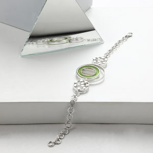 SILVER TONED BRACELET WITH CHARTREUSE ACRYLIC TANGENT & DOTTED CIRCLES