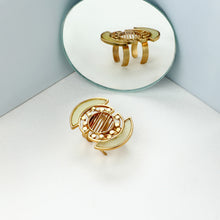 Load image into Gallery viewer, GOLD TONED DOUBLE RING WITH YELLOW ACRYLIC DOTTED ARCS &amp; TWIST LINED CIRCLE
