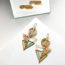 Load image into Gallery viewer, GOLD TONED SPLIT CIRCULAR TRIANGLE DROP EARRINGS WITH ACRYLIC &amp; DOTTED DETAILS
