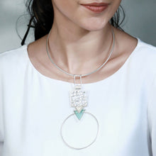 Load image into Gallery viewer, SILVER TONED CIRCULAR PENDANT COLLAR NECKLACE WITH CYAN ACRYLIC &amp; DOTTED DETAIL
