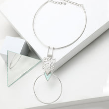 Load image into Gallery viewer, SILVER TONED CIRCULAR PENDANT COLLAR NECKLACE WITH CYAN ACRYLIC &amp; DOTTED DETAIL
