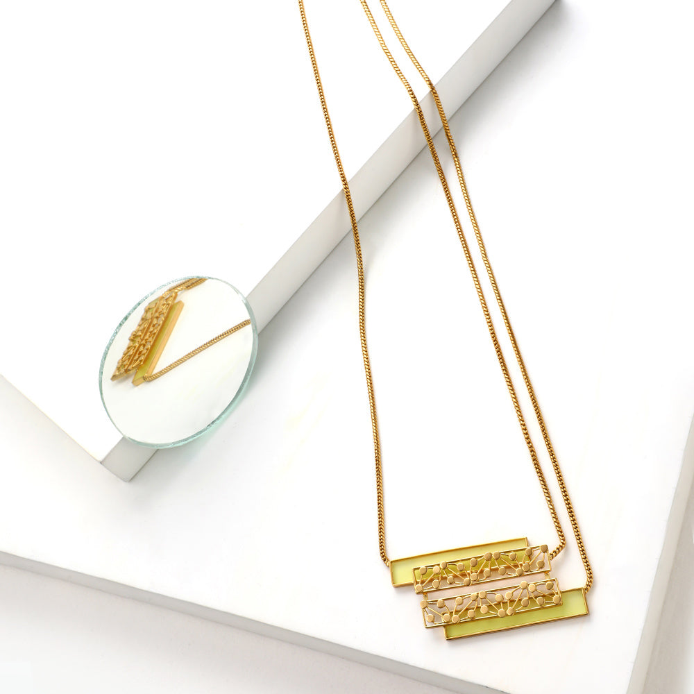 GOLD TONED CHAIN NECKLACE WITH YELLOW ACRYLIC & DOTTED BLOCK PENDANT