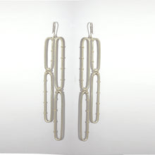Load image into Gallery viewer, Striking silver four link chain earring worn by catherine tresa
