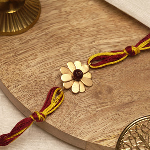 22K GOLD PLATED FLORAL PETALS RAKHI WITH RED AND YELLOW TIEUPS